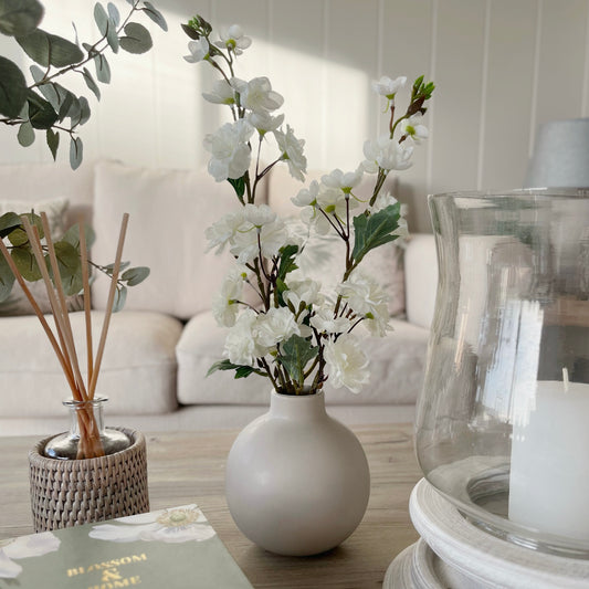 Blossom in Ceramic Bottle